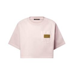 Top corto con tasca iconica